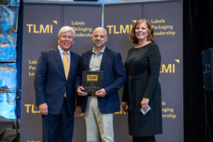 Greg Howell accepts TLMI Environmental Leadership Award for Flexo Concepts